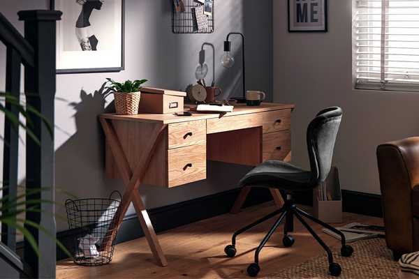 Wooden office desk with 5 drawers and wooden legs.